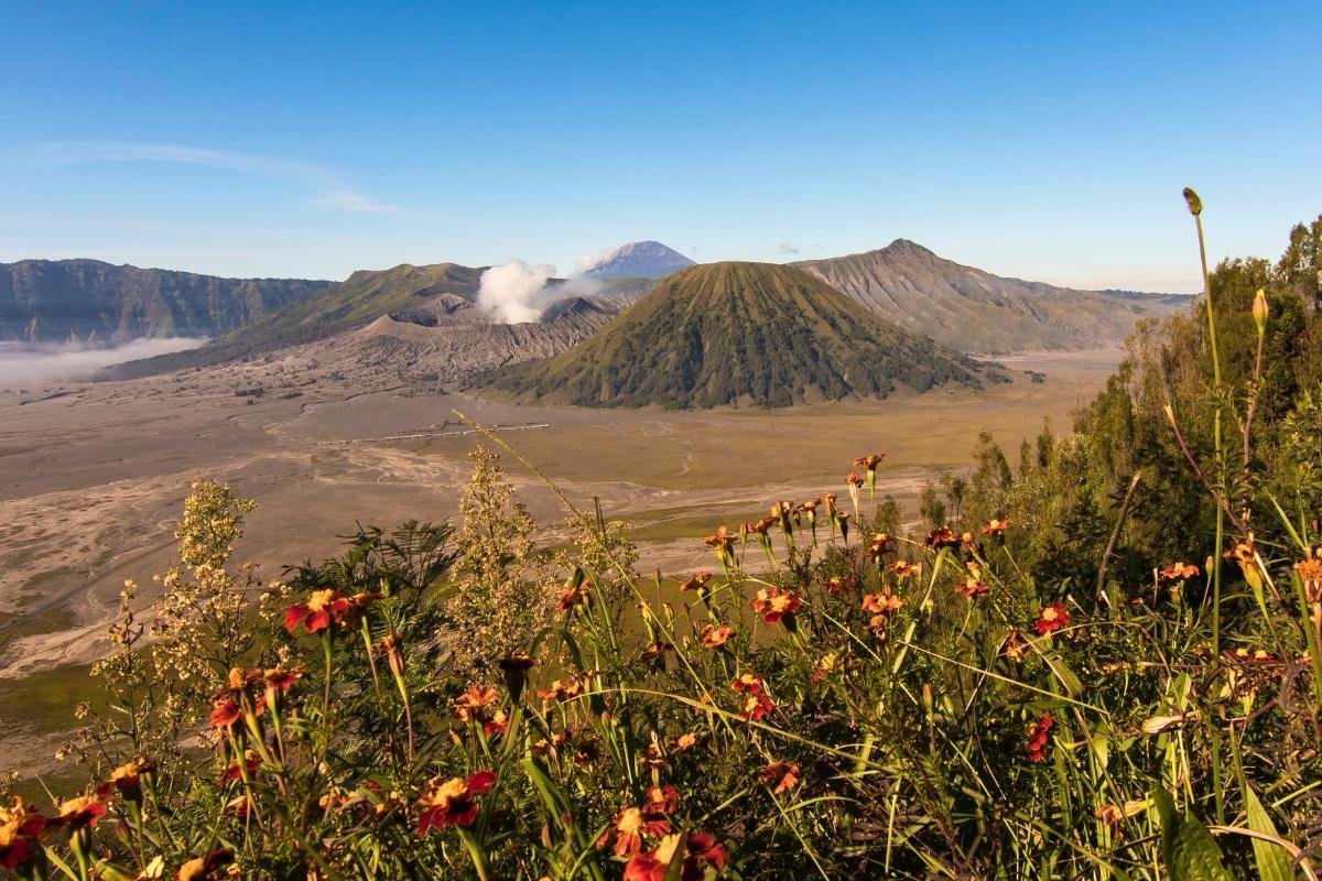 Text: Mount Bromo sunrise view during private tour from Bali 2 days 1 night