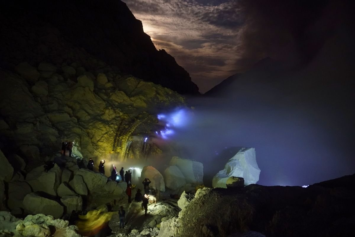 Blue fire phenomenon inside Ijen volcano crater at night