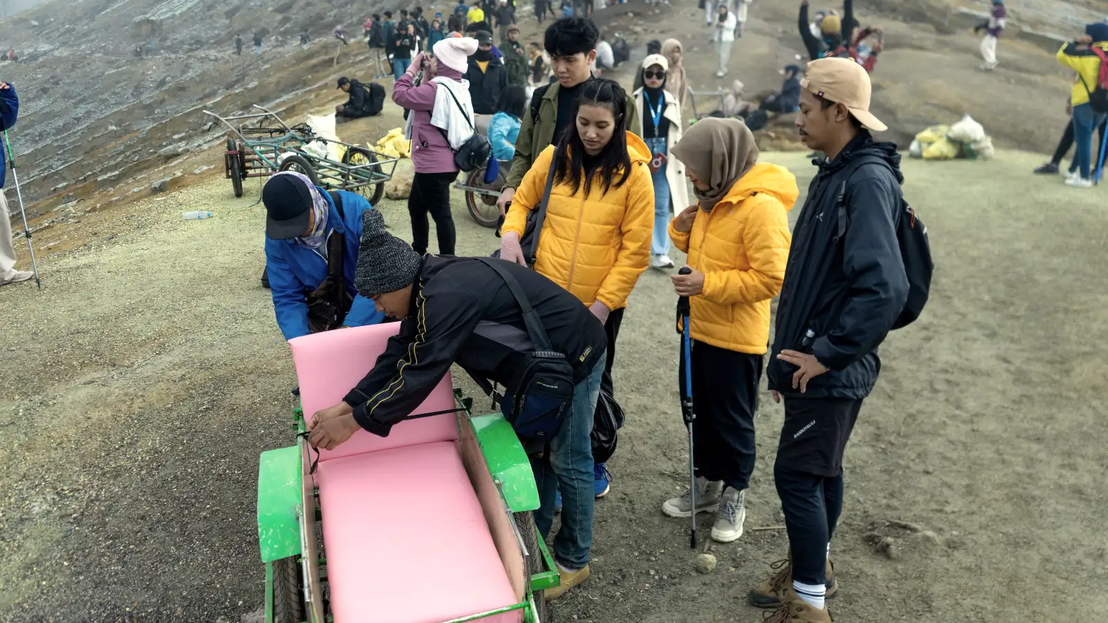 A group of trolley taxis waiting for passengers near the crater rim of Mount Ijen