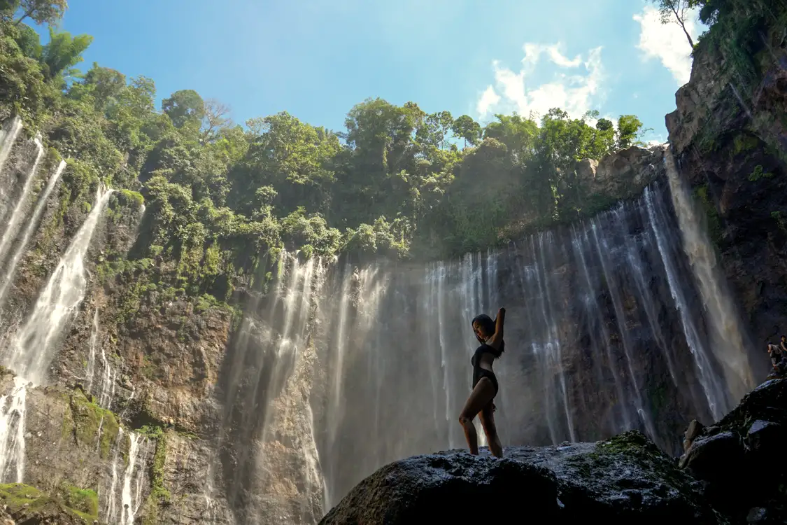 Tourists enjoying the view at Goa Tetes near Tumpak Sewu