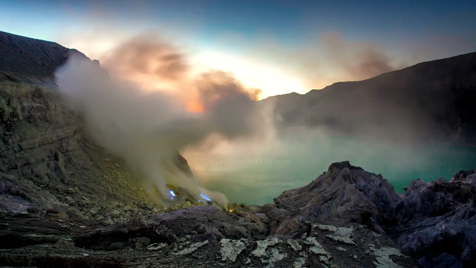 The Stunning Acid Lake of Ijen Turquoise acid lake at Ijen Crater during the day