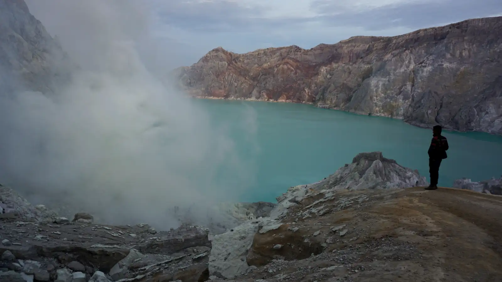 Aerial view of the turquoise acidic lake at Ijen Crater