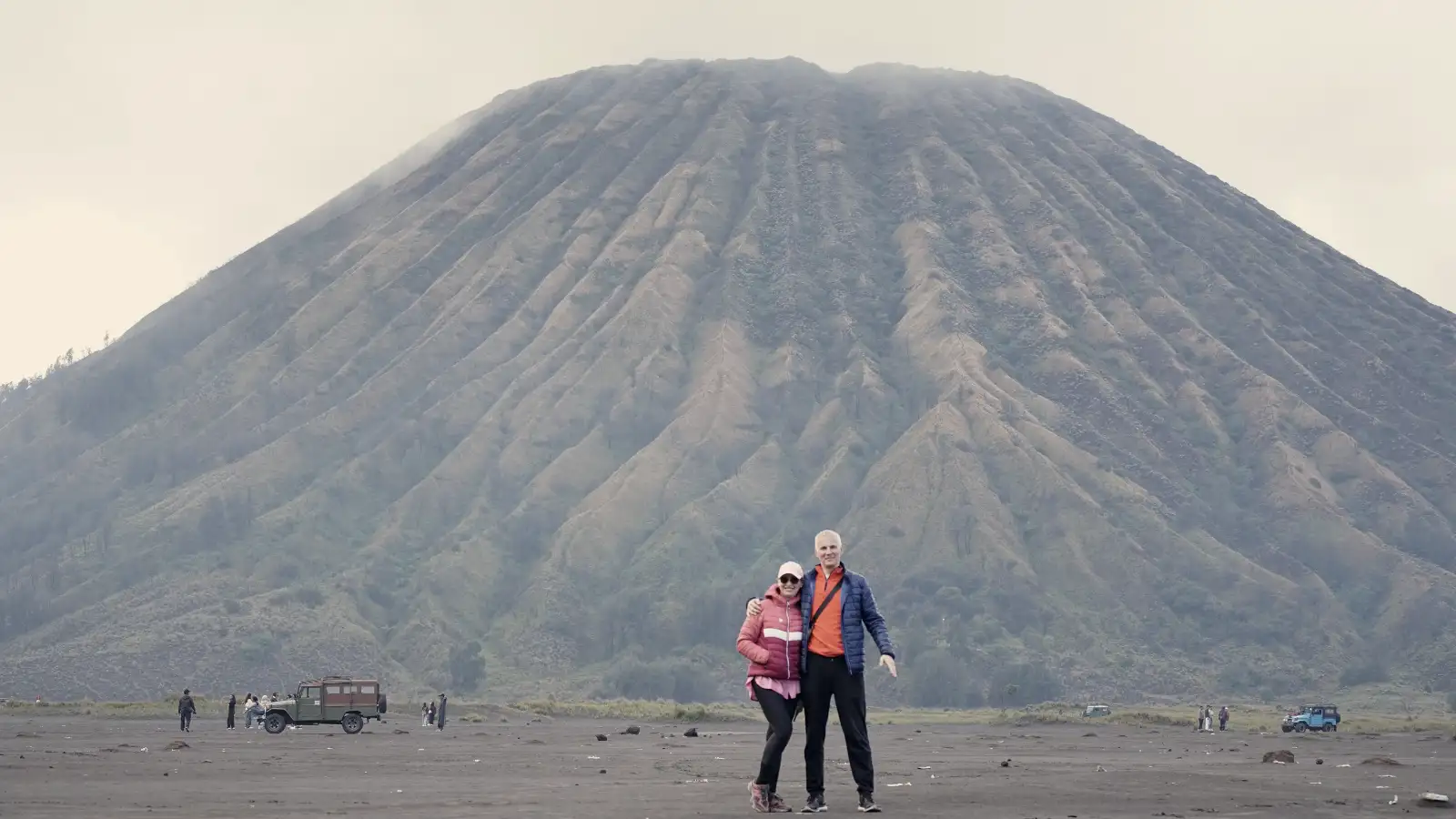 Mount Bromo sunrise view with volcanic smoke