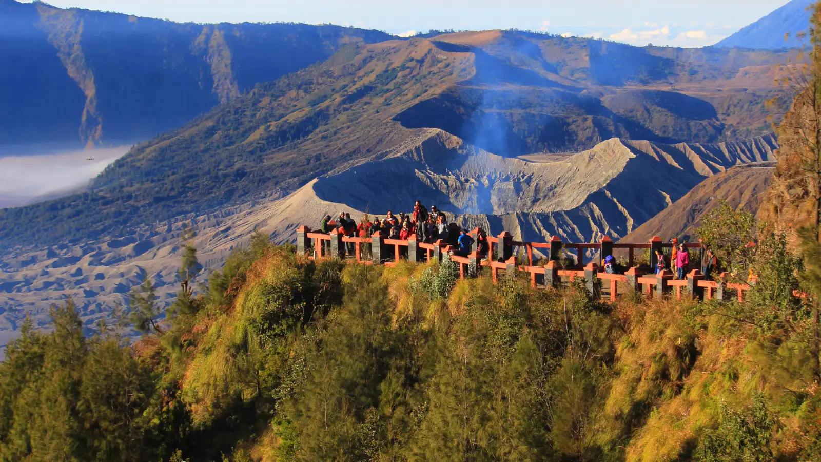 Local 4x4 Jeeps parked near Bromo viewpoints at dawn